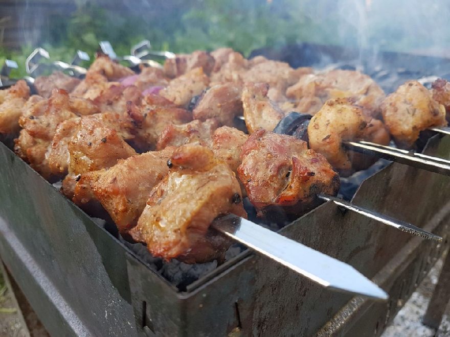 Delicious skewers of cabbage on a grill.